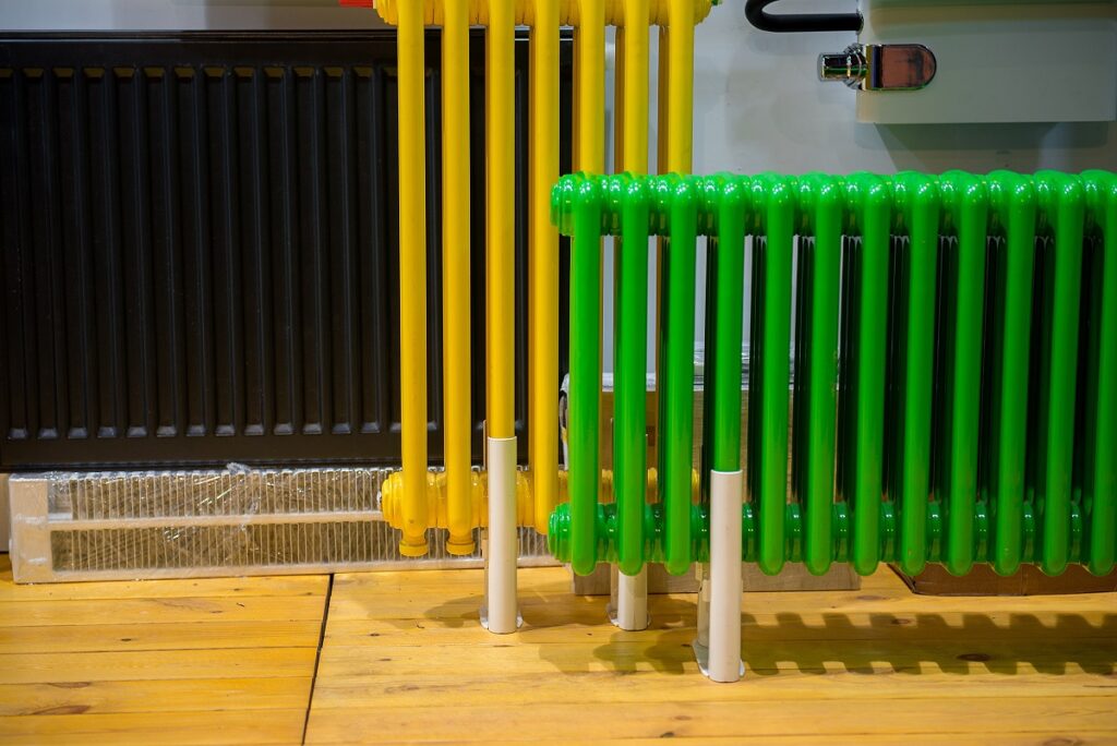 yellow black and green radiator in an apartment 2023 11 27 04 45 30 utc